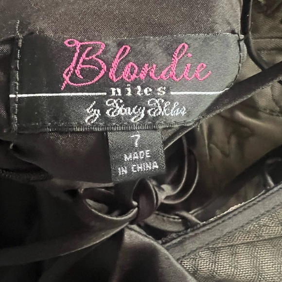 Short Black Corset dress. It was pockets and it is so comfy to wear. - Picture 3 of 5